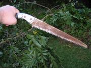 Hawaiian weed trimming implement.