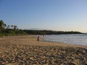 The sand looks like what we have in NJ!  But NJ doesn't have palm trees.  Or a volcano in the distance.