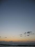 The moon way above the ocean