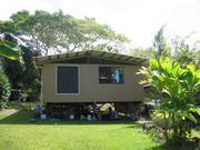 The back of the house, with under-house storage.