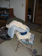My host packs a few pieces of warm clothing for herself.