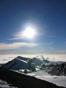 Left is the California Insititure of Technology Submillimeter Telescope (CSO), middle is the James Clerk Maxwell Telescope (JCMT).  Above is the sun.