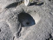 Bowls dug into the volcanic rock, for cooking, making salt, etc.