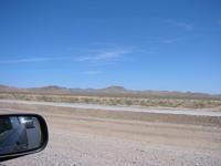 The view while sitting in traffic in the middle of a desert.