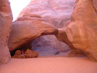 Sand Dune Arch.  There was a family playing in the rocks in the area.  The fine sand is the same you would find on a Jersey beach, only it is all pink.  And because you are between the rocks, it is cool and shady. 