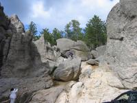 Kids climbing the rocks.
