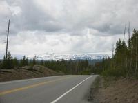 Snowy mountains, and not the most friendly clouds.